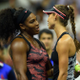 Serena Williams and opponent Vitalia Diatchenko meet at the net after Diatchenko withdrew during their women’s singles round 1 match at the U.S. Open in New York City Aug. 31, 2015.
Don Emmert/AFP/Getty Images